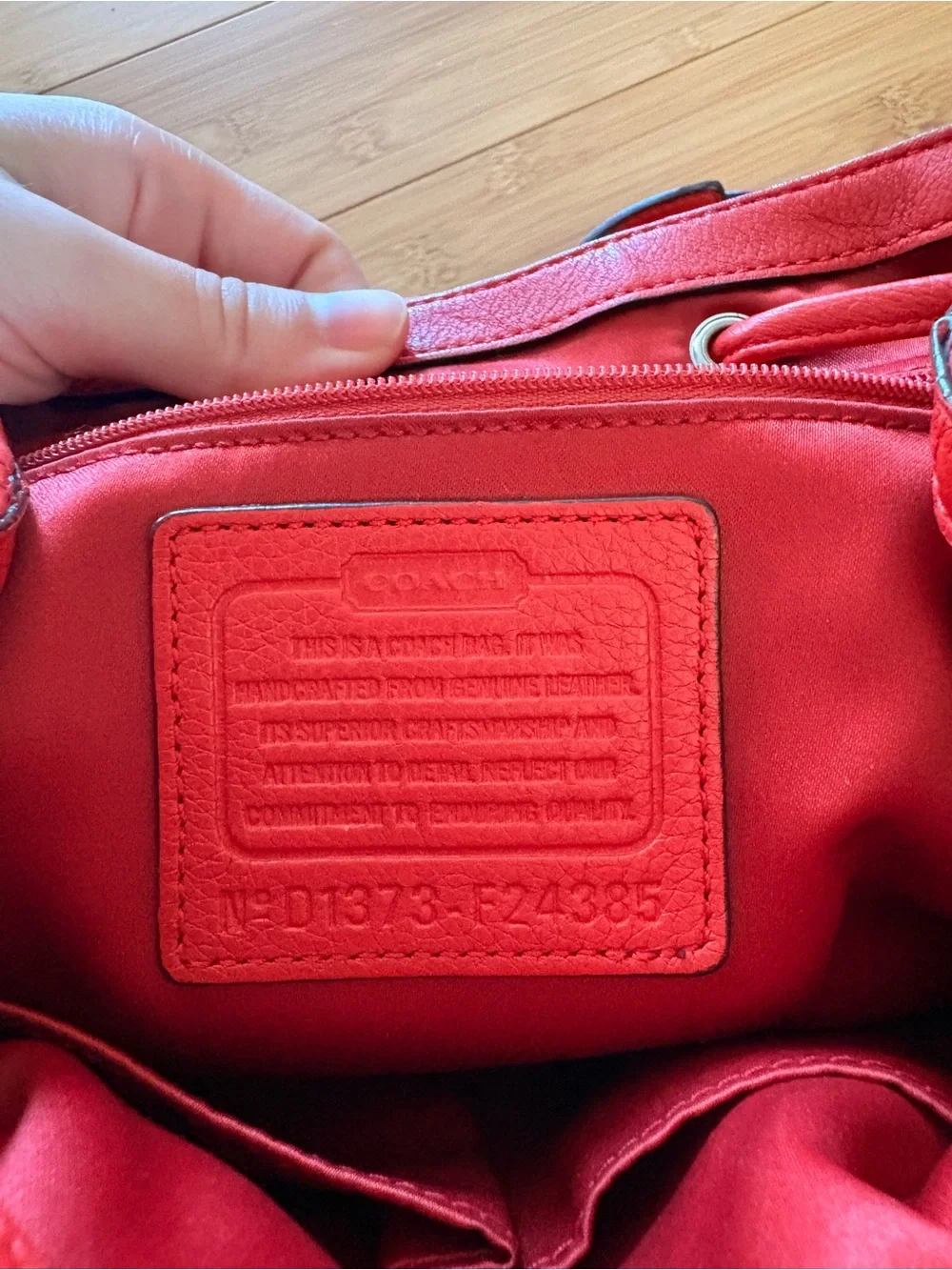 Coach Pebbled Leather Backpack in Red with Orange Tag